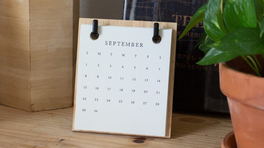 A paper calendar showing the month of September.