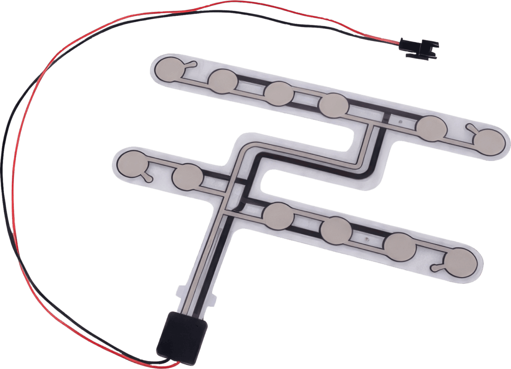 An isolated image of a car seat pressure sensor.