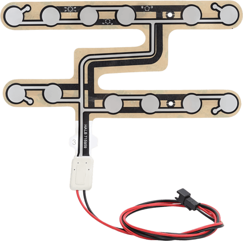 An isolated image of a car seat pressure sensor. Attached to the sensor are a red and black wire.