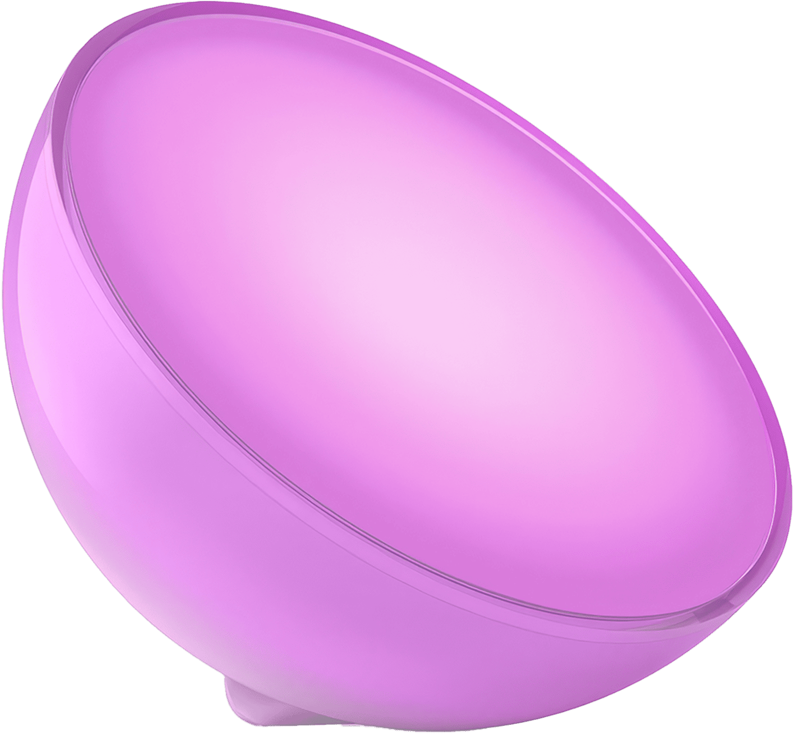 A Philips Hue Go portable accent light illuminated in a cosy room, emitting a warm glow that enhances the room's ambiance.